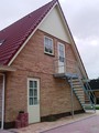 Buiten steektrap met bordes