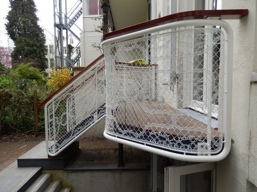 Buitentrap met design balustrade