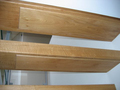 Zwevende trap met houten treden