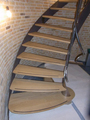 Wenteltrap met ijzeren balustrade