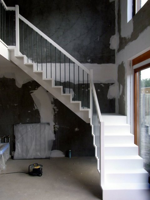 Houten trap met stootborden