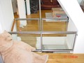 Glas hek met roestvast staal en kinderhekje