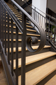 Stalen trap met houten treden in winkel BDT14